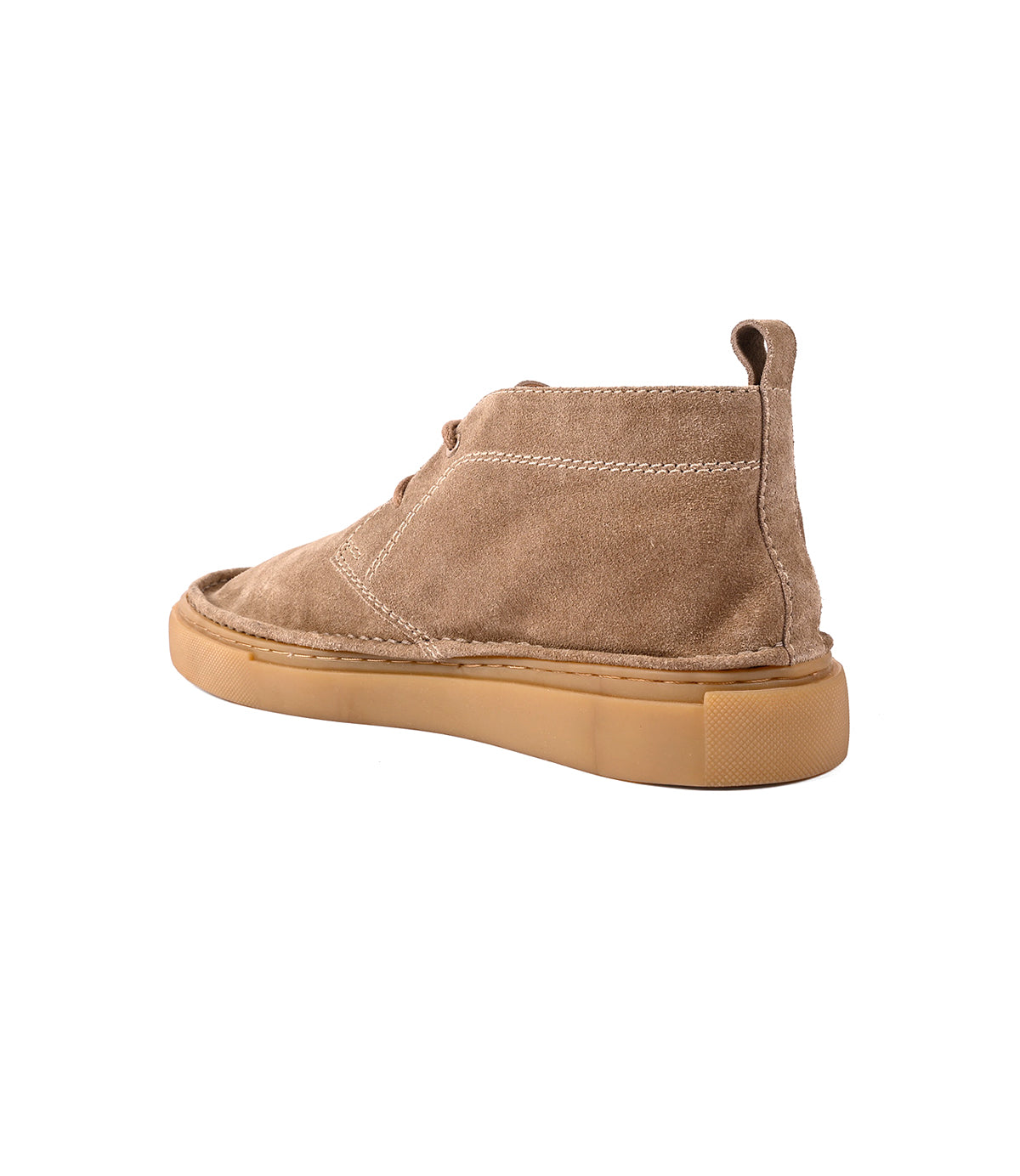 
                  
                    Roan Volunteer chukka boot in tan suede, featuring a sneaker-style sole and pull tab, shown from the back left angle against a white background.
                  
                