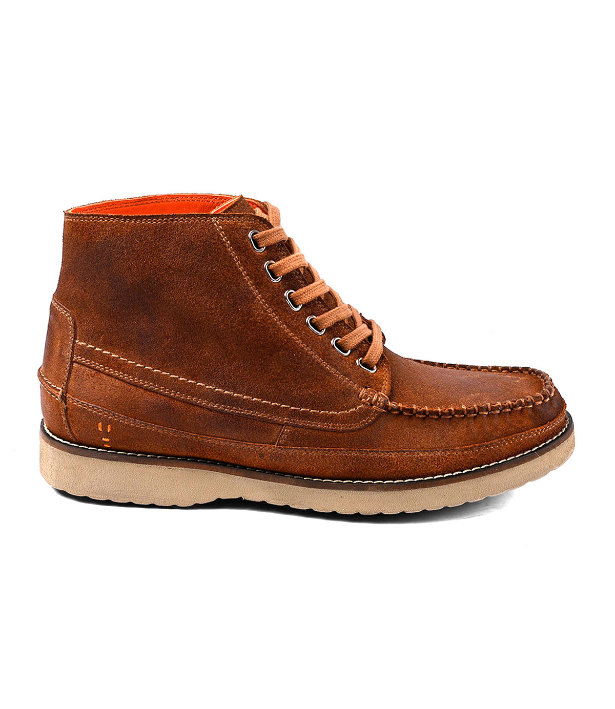 The Roan Warden is a brown leather moc toe chukka boot with visible stitching, tan laces, metal eyelets, and a beige rubber sole, shown in profile against a white background.