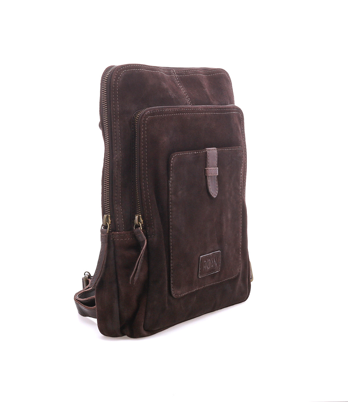 
                  
                    The Roan Yearling is a dark brown premium suede crossbody bag featuring leather straps and multiple zippered compartments, including a convenient front pocket, displayed against a plain white background.
                  
                