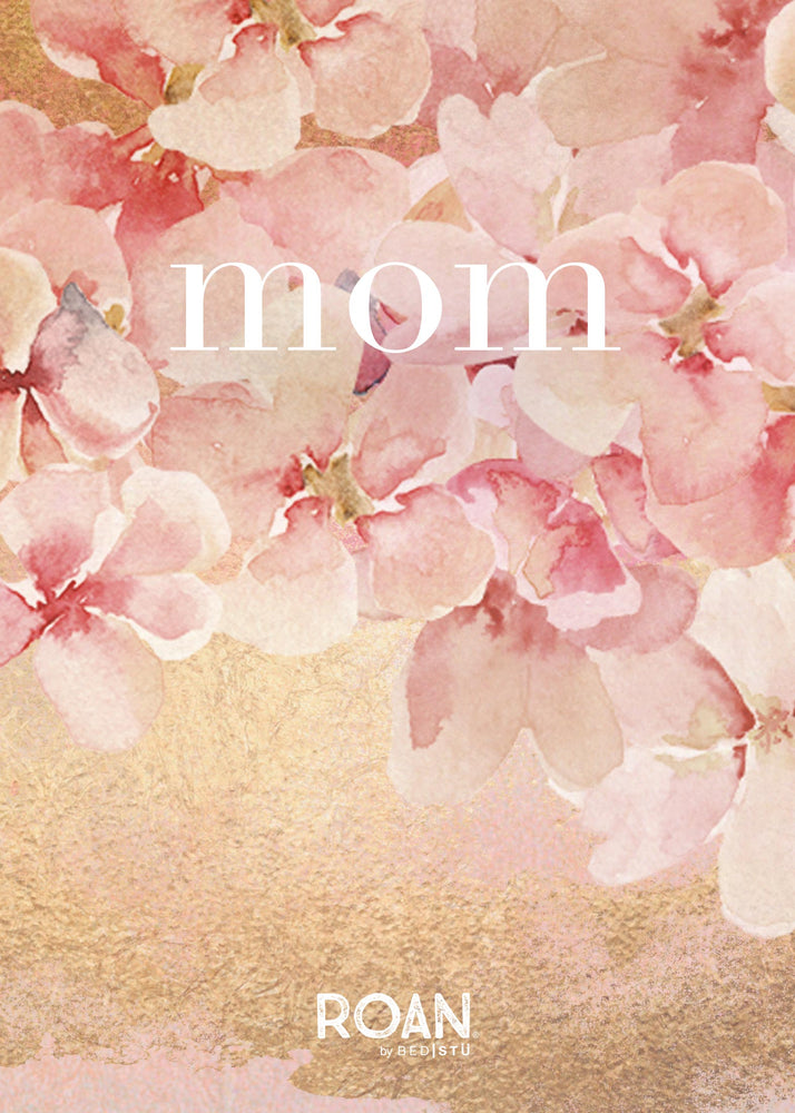 A floral Roan eGift card with pink blossoms and the word "mom" in white text, set against a textured pink and beige background.