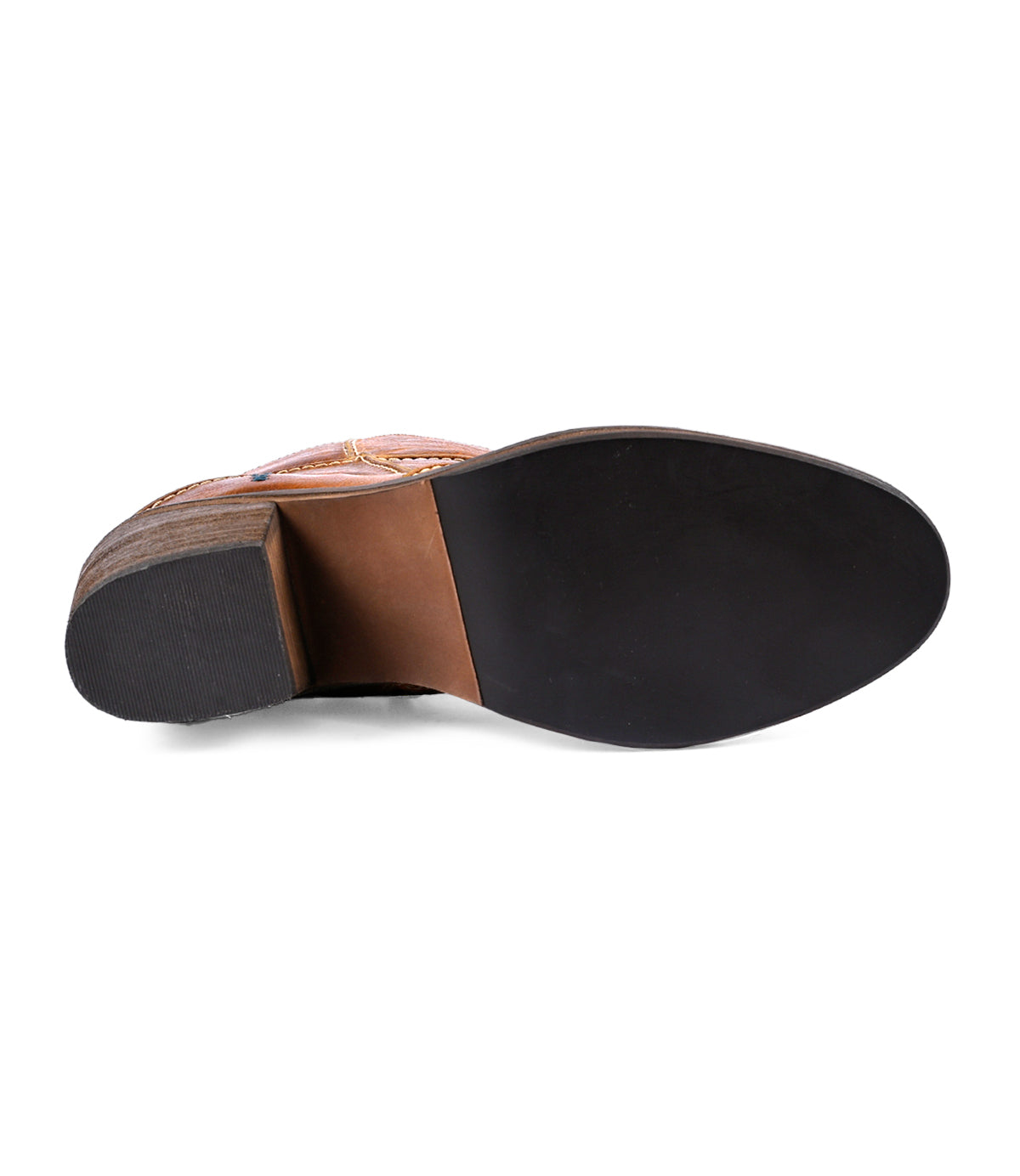 
                  
                    The image showcases the sole of Roan's Often boot, featuring a wooden heel and a smooth black outsole, exemplifying creative craftsmanship.
                  
                