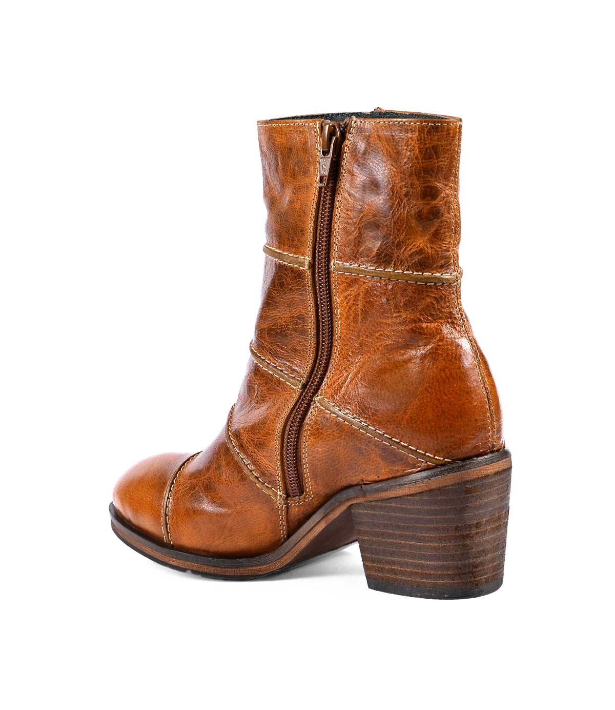 
                  
                    The 'Often' brown leather ankle boot from Roan, featuring intricate piping and a side zipper, is beautifully accentuated with a chunky heel and is elegantly showcased at a slight angle.
                  
                