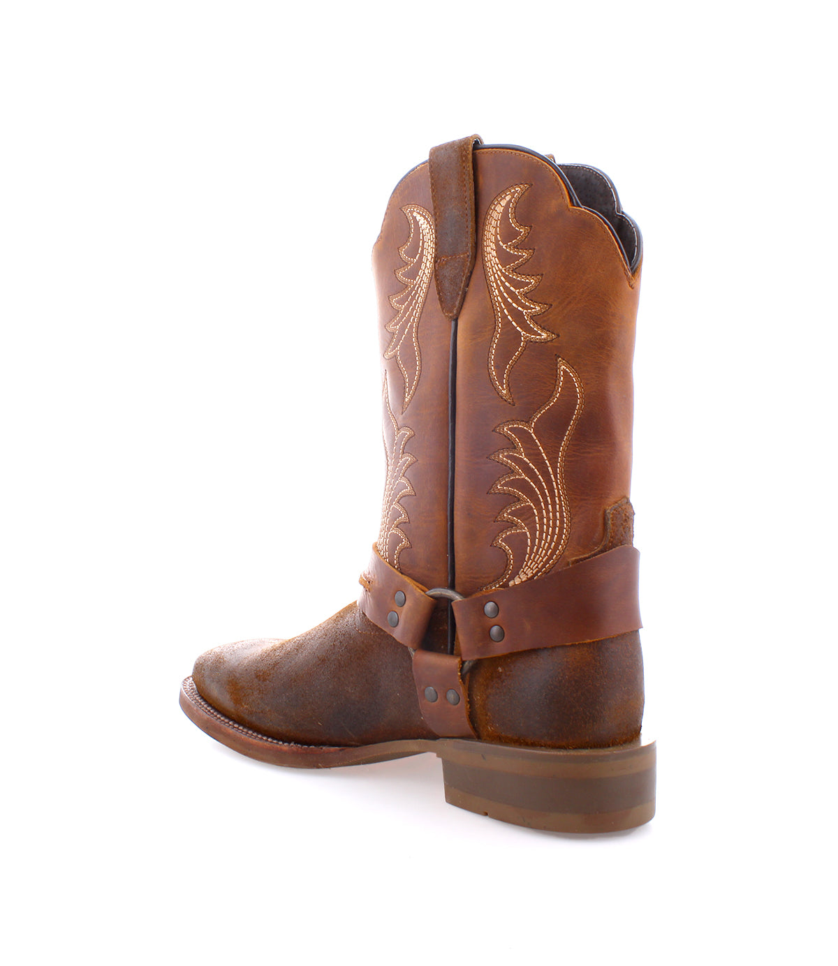 
                  
                    The Roan Saga boot is a stylish Western boot made of premium leather, featuring decorative stitching and an ankle strap, viewed from the side.
                  
                